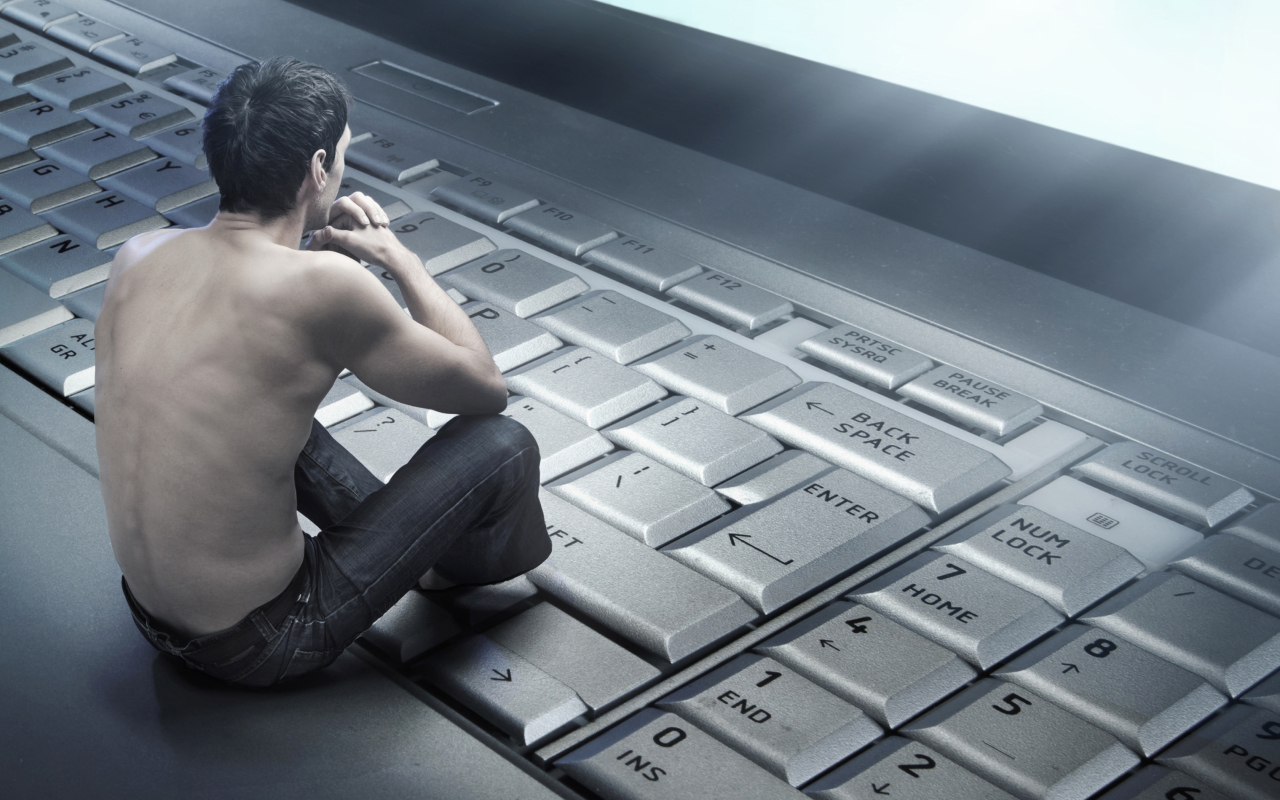 Man Sitting On Keyboard wallpaper 1280x800