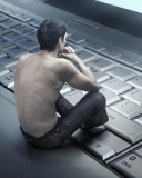 Man Sitting On Keyboard wallpaper 128x160