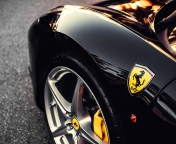 Screenshot №1 pro téma Black Ferrari With Yellow Emblem 176x144