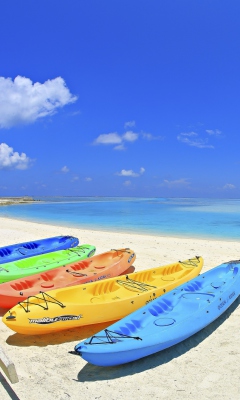 Fondo de pantalla Colorful Boats At Maldives Beach 240x400