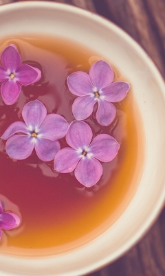 Das Cup Of Tea And Lilac Flowers Wallpaper 240x400
