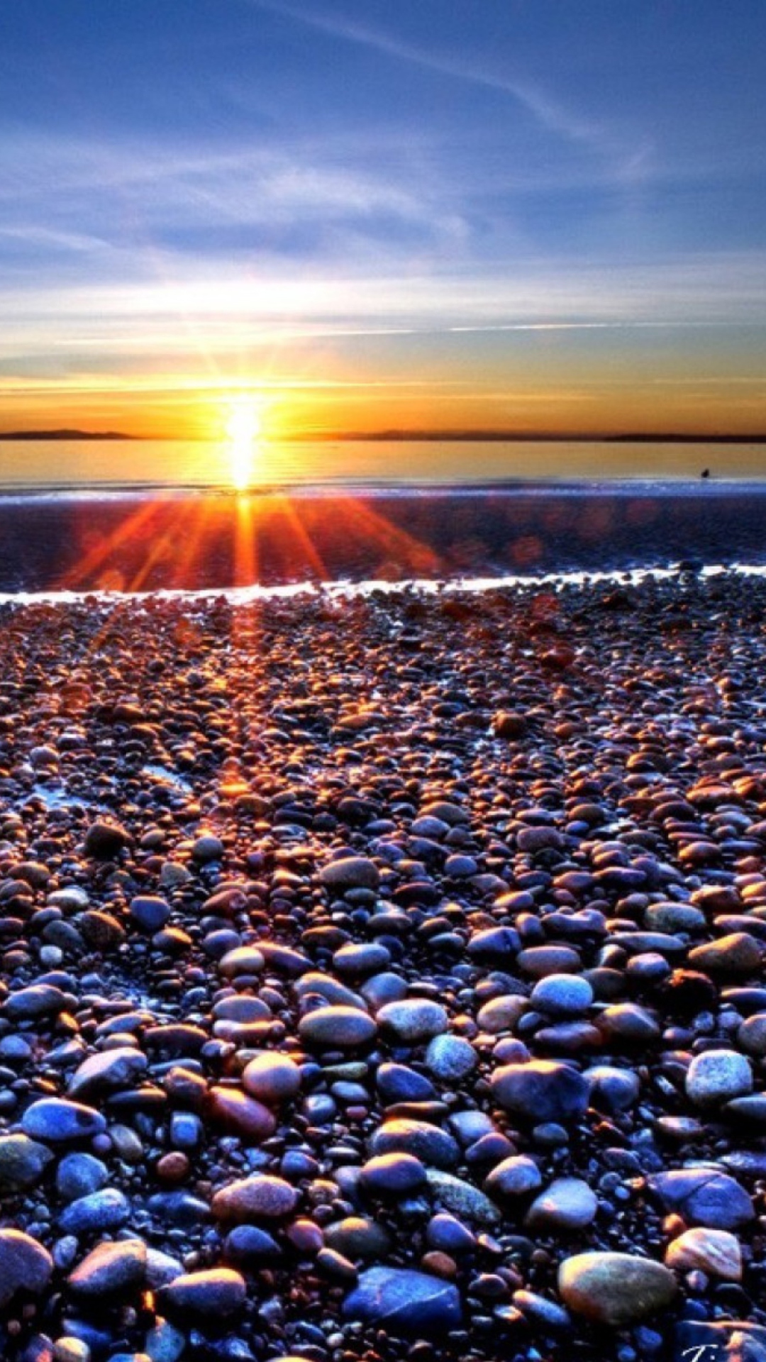 Screenshot №1 pro téma Beach Pebbles In Sun Lights At Sunrise 1080x1920