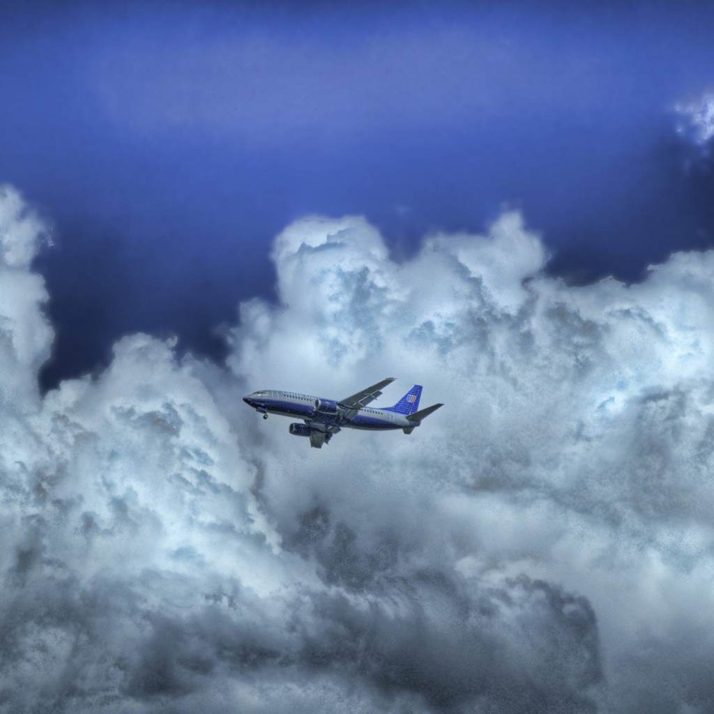 Обои Airplane In Clouds 1024x1024