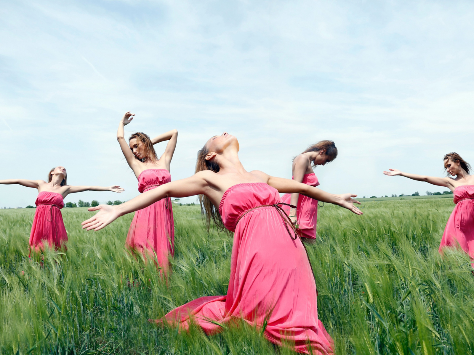 Girl In Pink Dress Dancing In Green Fields wallpaper 1600x1200