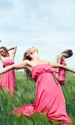 Обои Girl In Pink Dress Dancing In Green Fields 240x400