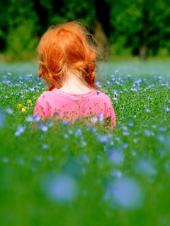 Redhead Child Girl Behind Green Grass wallpaper 240x320