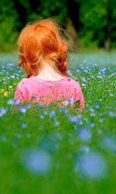 Обои Redhead Child Girl Behind Green Grass 240x400