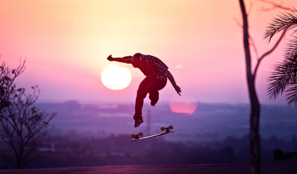 Fondo de pantalla Sunset Skateboard Jump 1024x600