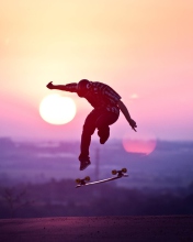 Обои Sunset Skateboard Jump 176x220