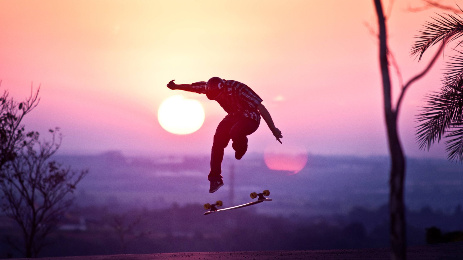 Fondo de pantalla Sunset Skateboard Jump 1920x1080
