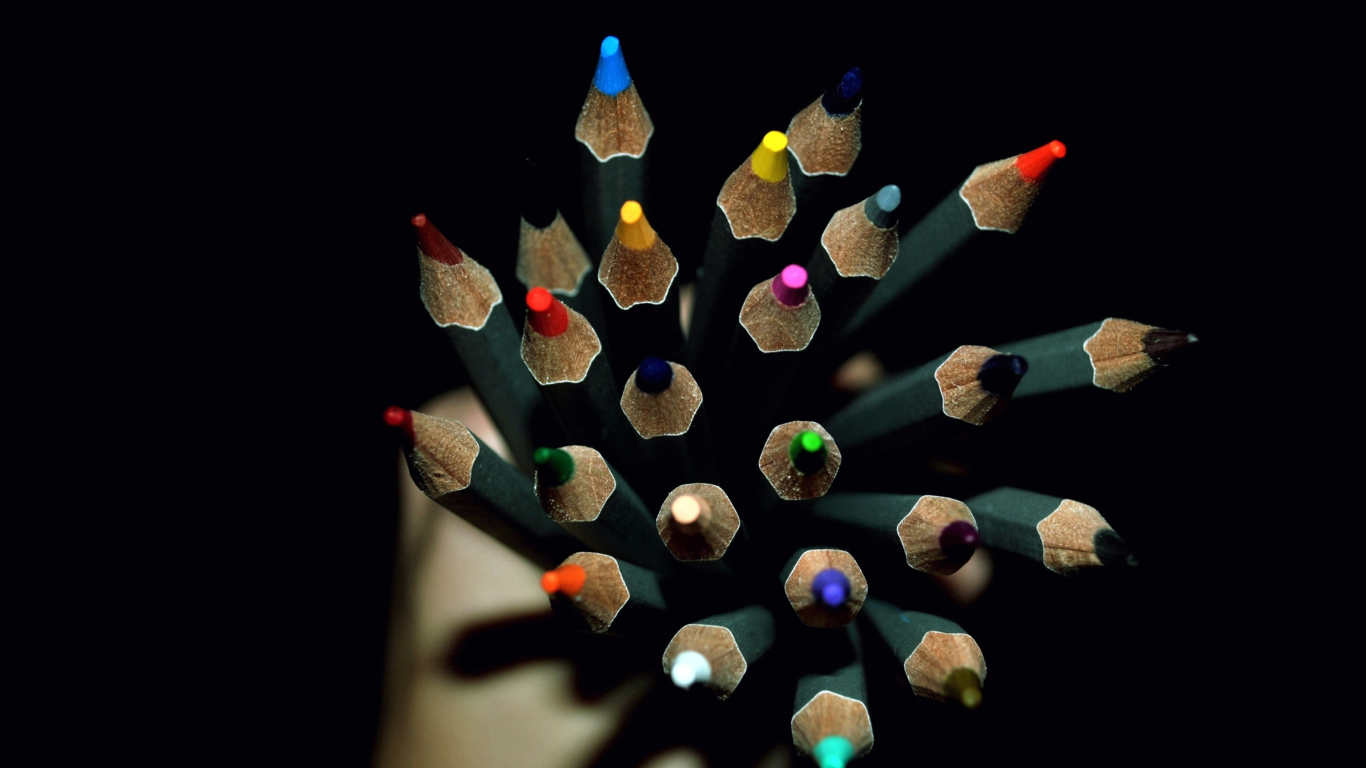 Colorful Pencils In Hand wallpaper 1366x768