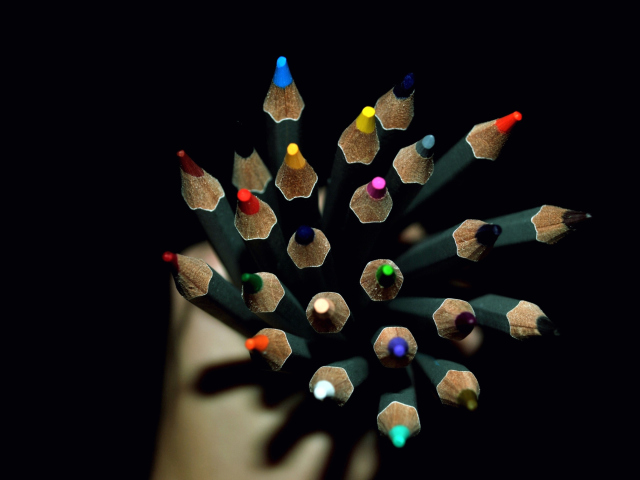 Colorful Pencils In Hand wallpaper 640x480