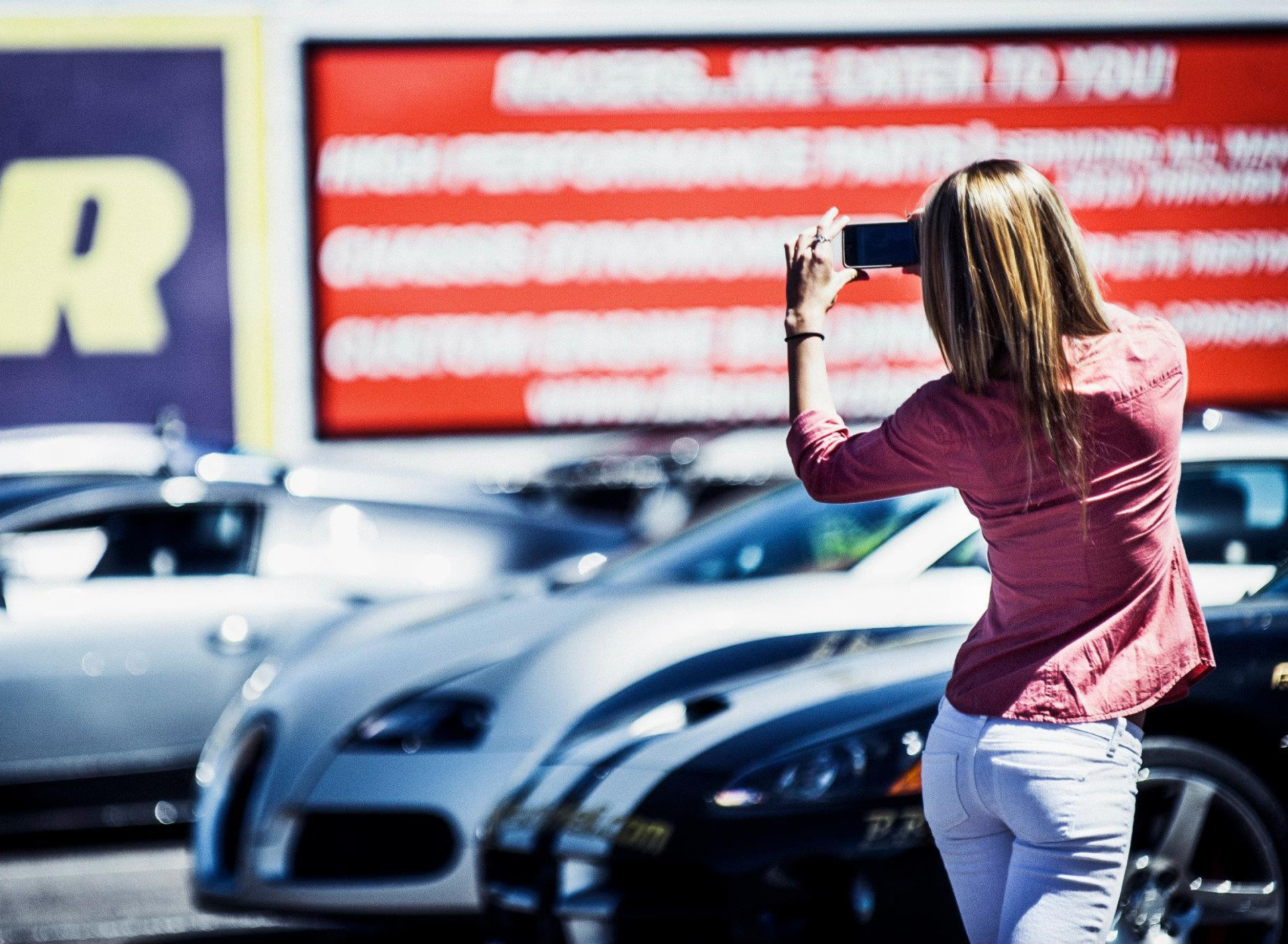 Обои Girl Taking Photo With Her Phone 1920x1408