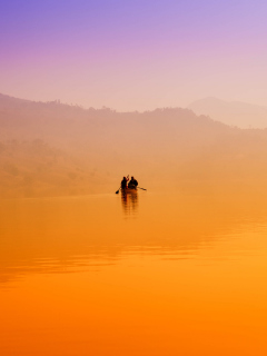 Fondo de pantalla Foggy Lake And Lonely Boat 240x320