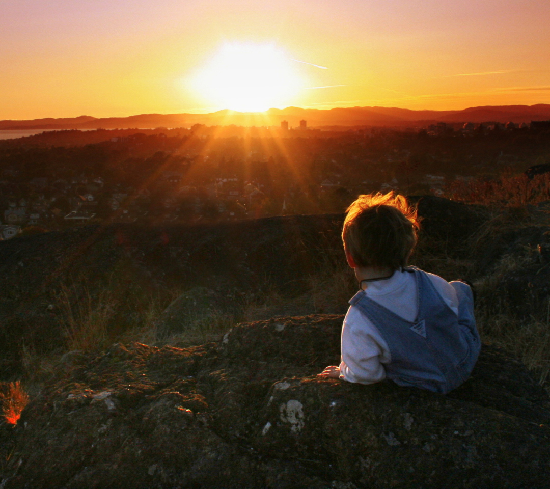 Little Boy Looking At Sunset From Hill wallpaper 1080x960