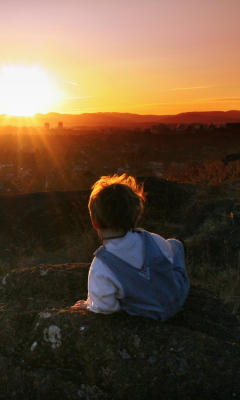Little Boy Looking At Sunset From Hill wallpaper 240x400