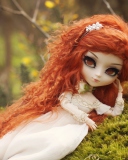 Fondo de pantalla Curly Redhead Doll 128x160