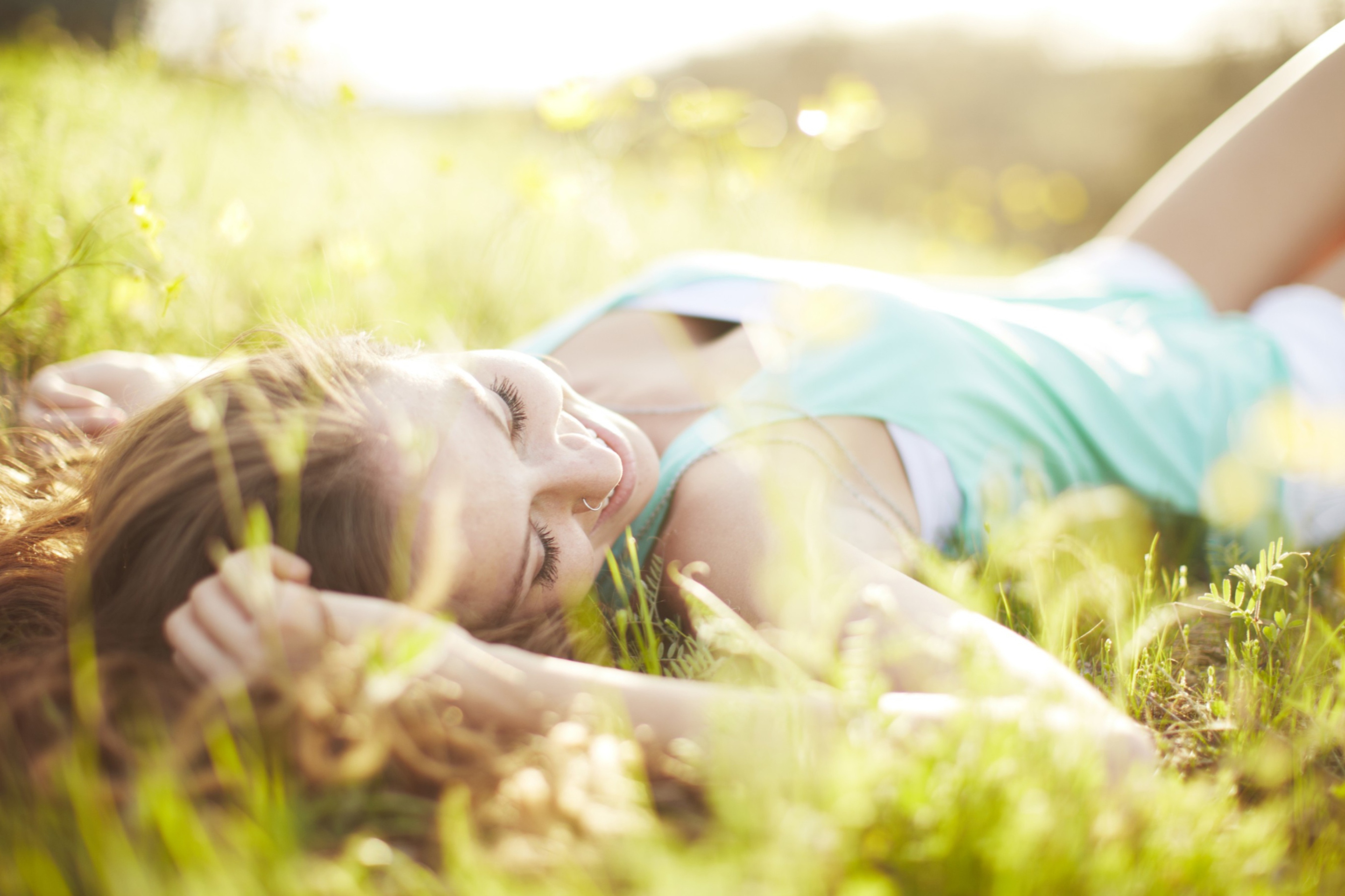 Happy Girl Lying In Grass In Sunlight screenshot #1 2880x1920