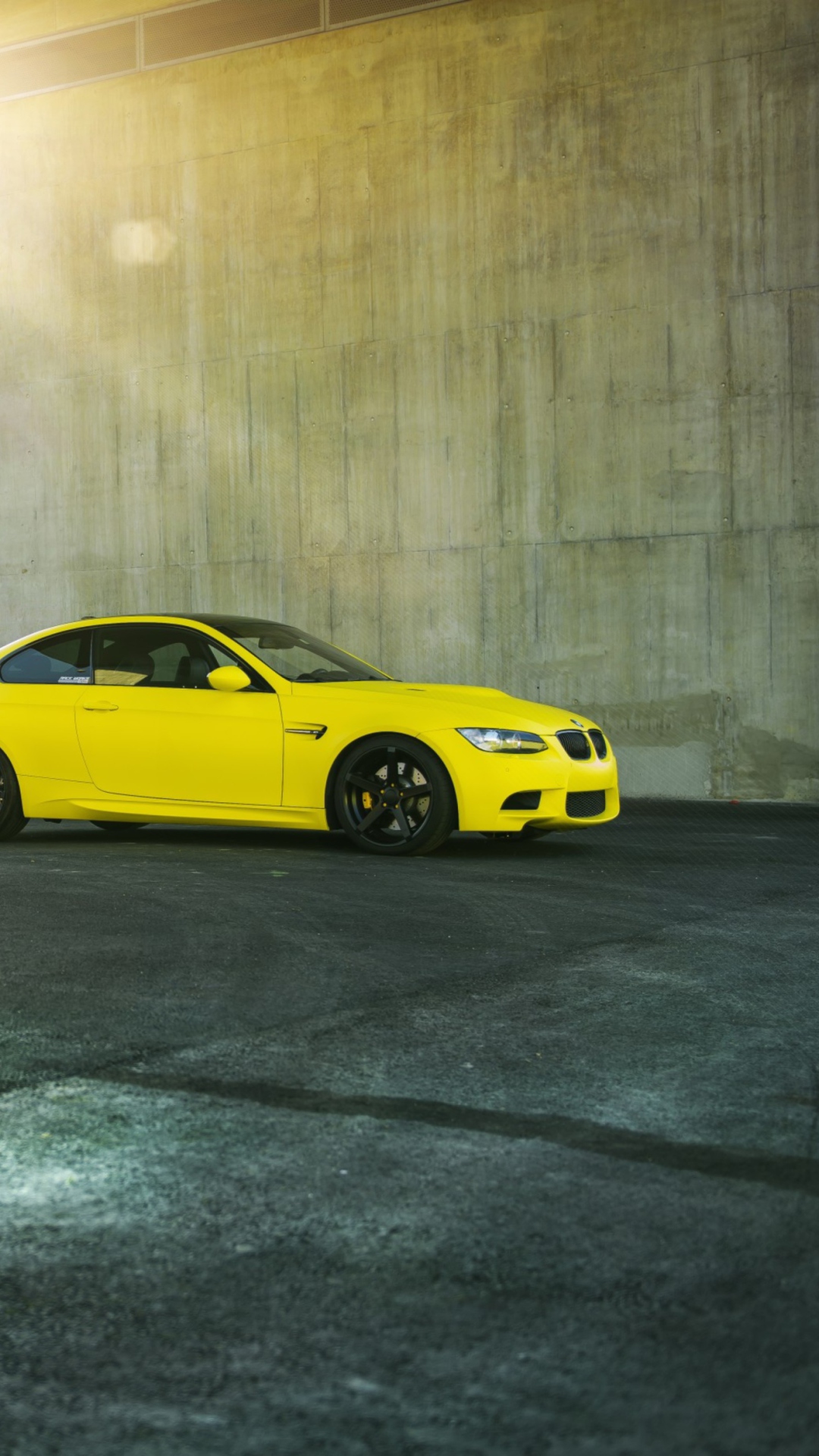Yellow BMW wallpaper 1080x1920