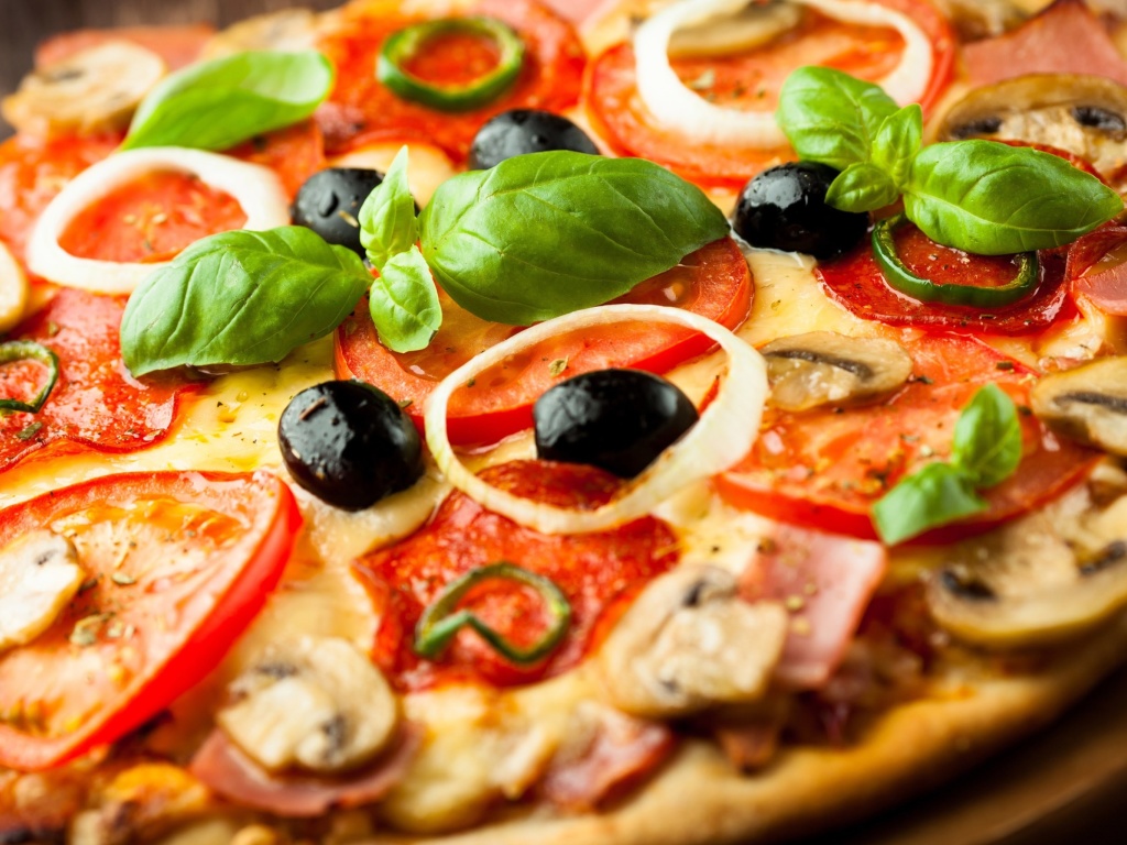 Pizza with mushrooms and tomatoes wallpaper 1024x768