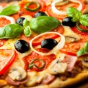 Pizza with mushrooms and tomatoes wallpaper 128x128