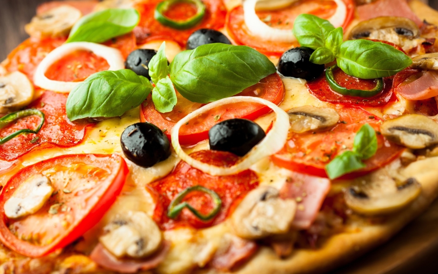 Pizza with mushrooms and tomatoes wallpaper 1440x900