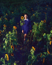 Sfondi Girl In Blue Dress In Sunflower Field 176x220