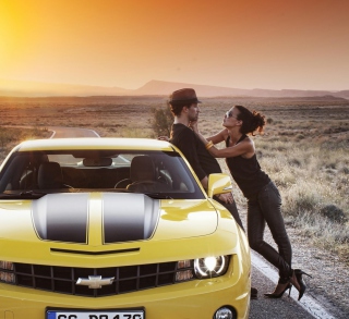 Couple And Yellow Chevrolet - Obrázkek zdarma pro 1024x1024