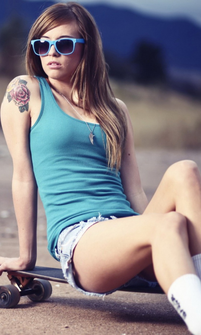 Skater Girl With Tattoo wallpaper 768x1280