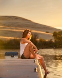 Girl fisherman wallpaper 128x160