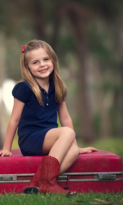 Little Girl Sitting On Red Suitcase screenshot #1 240x400
