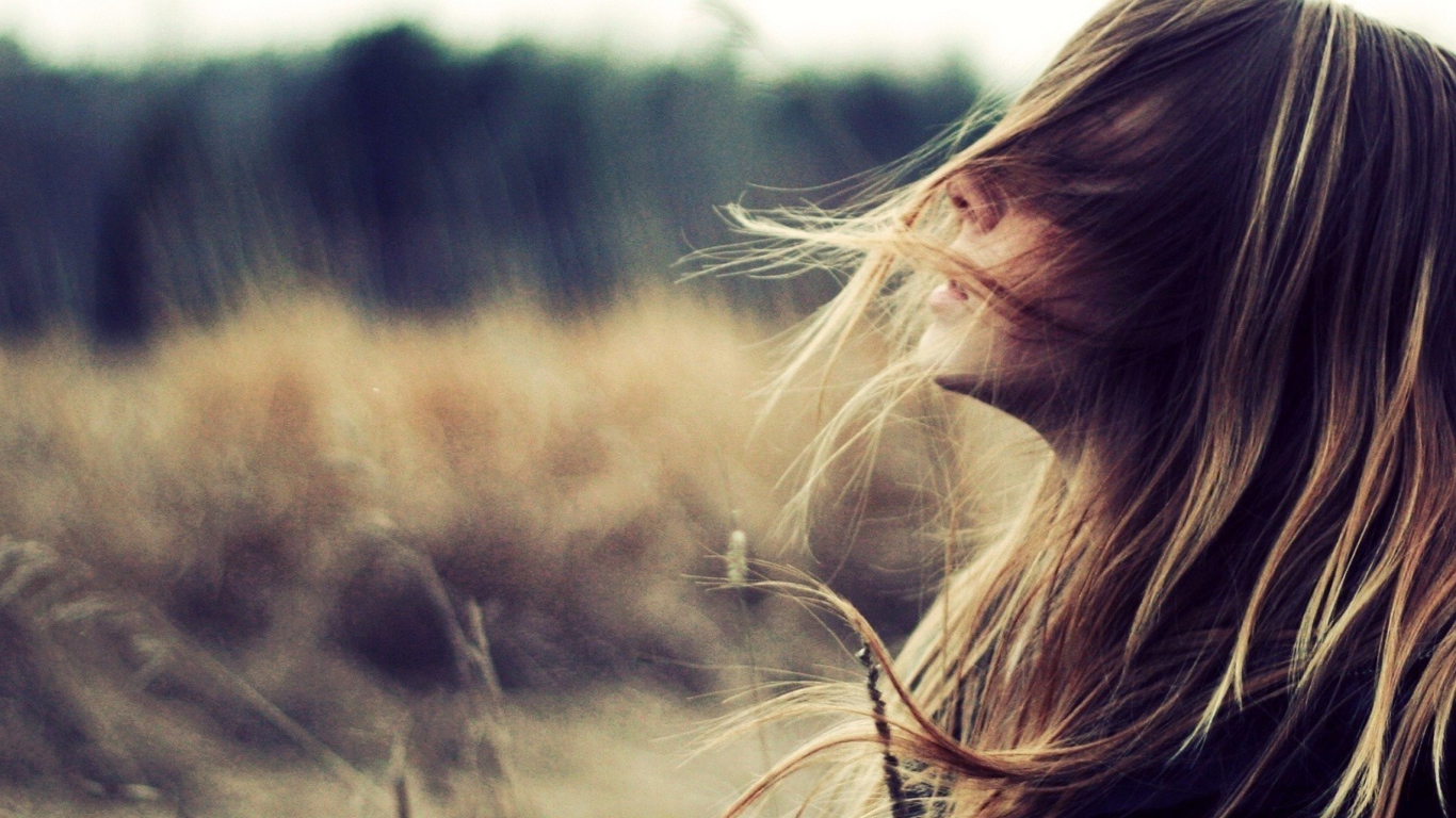 Обои Beautiful Girl With Wind In Her Hair 1366x768