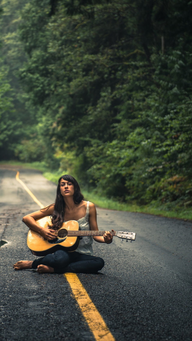 Girl Playing Guitar On Countryside Road wallpaper 640x1136
