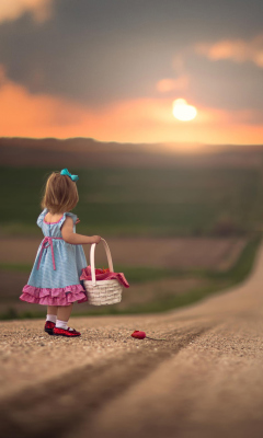 Fondo de pantalla Little Girl With Flower Basket 240x400