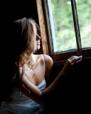 Girl Looking At Window wallpaper 128x160