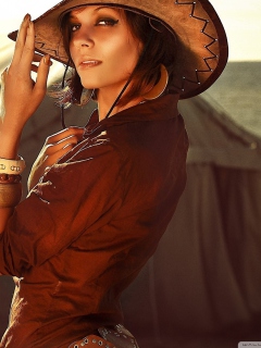 Fondo de pantalla Cowgirl 240x320