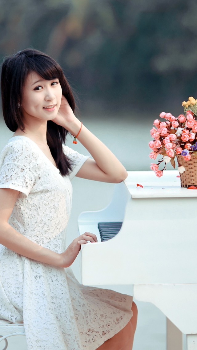 Young Asian Girl By Piano wallpaper 640x1136