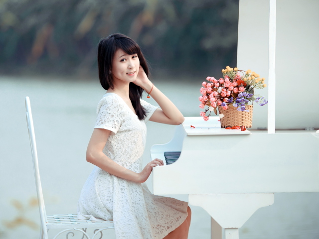 Young Asian Girl By Piano wallpaper 640x480