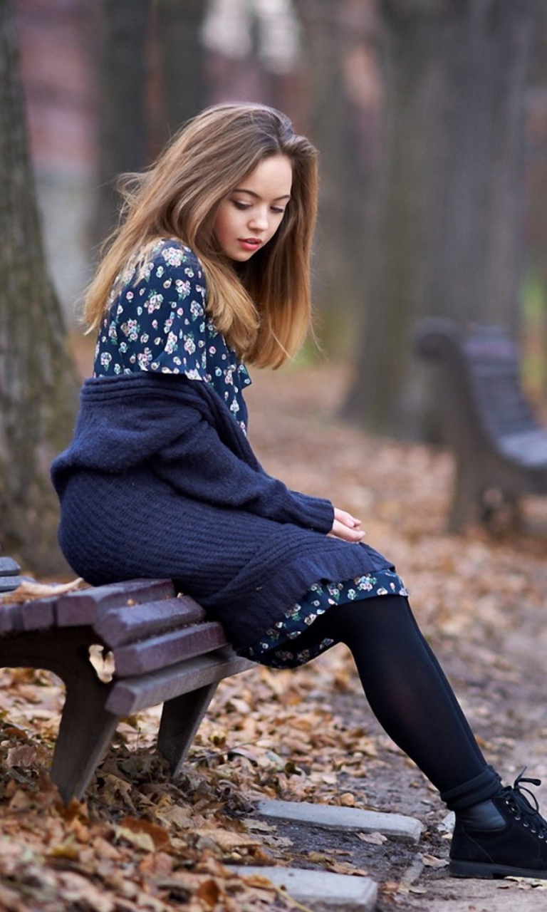Beautiful Girl Sitting On Bench In Autumn Park screenshot #1 768x1280