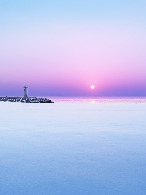 Lighthouse On Sea Pier At Dawn wallpaper 480x640