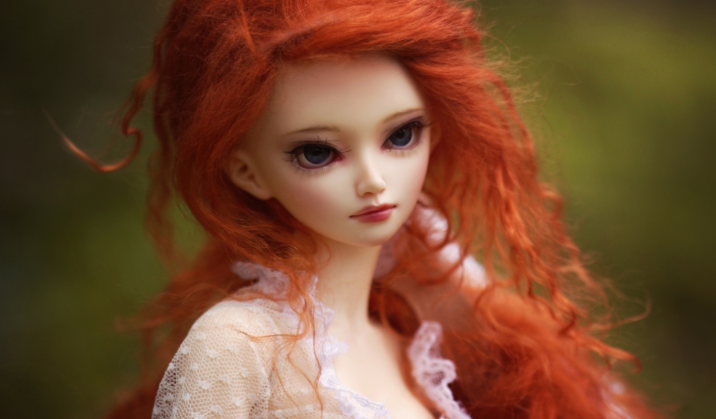 Das Gorgeous Redhead Doll With Sad Eyes Wallpaper 1024x600
