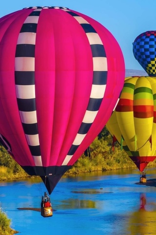 Fondo de pantalla Colorful Air Balloons 320x480