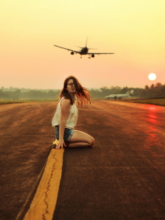 Airplane Over Girl's Head wallpaper 240x320