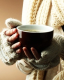 Hot Cup Of Coffee In Cold Winter Day wallpaper 128x160