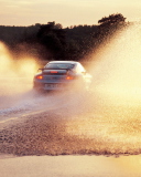 Das Porsche GT2 In Water Splashes Wallpaper 128x160