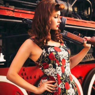 Pin up model with Gun Wallpaper for iPad 2