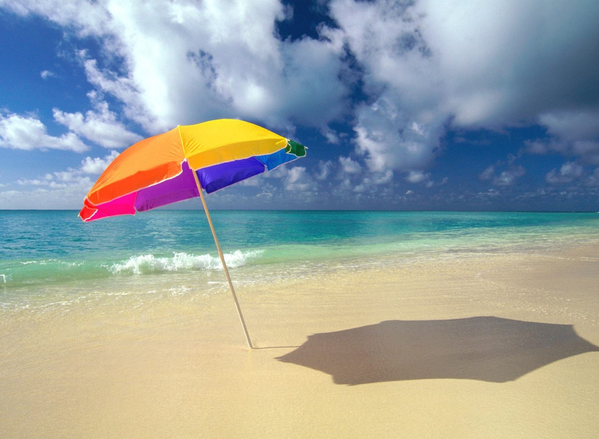 Обои Rainbow Umbrella At Beach 1920x1408