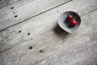 Two Red Cherries On Plate On Wooden Table - Obrázkek zdarma 