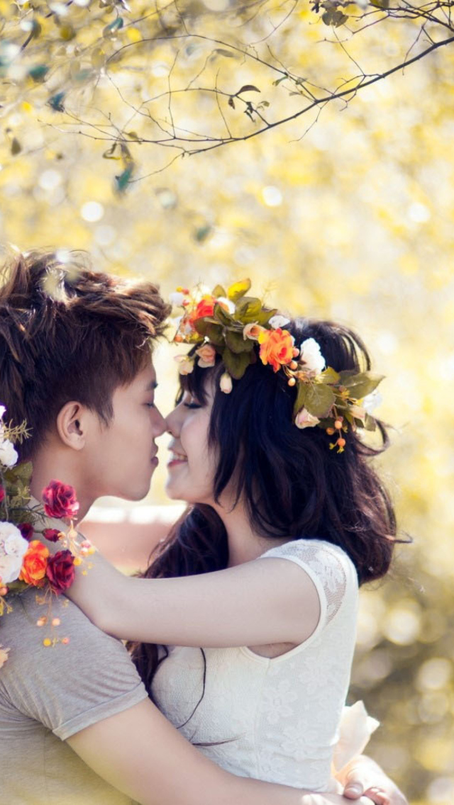 Beautiful Asian Couple In Love wallpaper 640x1136