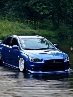 Sfondi Mitsubishi Lancer Evolution X 240x320